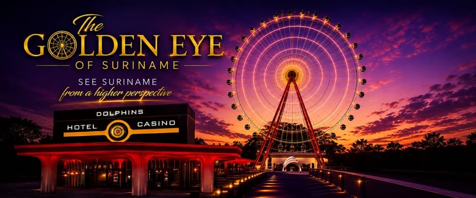 The Golden Eye of Suriname — see Suriname from a higher perspective. The lit wheel beside the Dolphins Hotel & Casino at sunset.